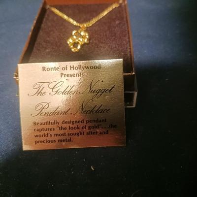 BULOVA DUEL TIME ZONE WATCH AND THE GOLDEN NUGGET PENDANT NECKLACE