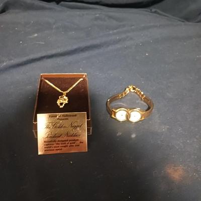 BULOVA DUEL TIME ZONE WATCH AND THE GOLDEN NUGGET PENDANT NECKLACE