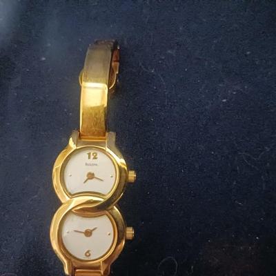 BULOVA DUEL TIME ZONE WATCH AND THE GOLDEN NUGGET PENDANT NECKLACE