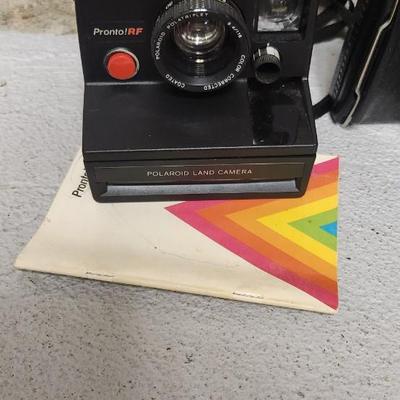 Sale Photo Thumbnail #708: Pair of Polaroids - Pronto RF and Square Shooter 2 with bag.  Few flash squares as well. Fits larger flat rate box