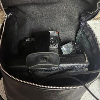 Sale Photo Thumbnail #717: Pair of Polaroids - Pronto RF and Square Shooter 2 with bag.  Few flash squares as well. Fits larger flat rate box