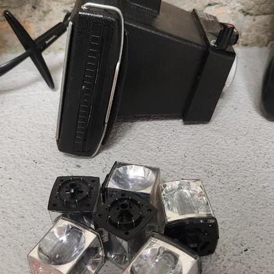 Sale Photo Thumbnail #713: Pair of Polaroids - Pronto RF and Square Shooter 2 with bag.  Few flash squares as well. Fits larger flat rate box