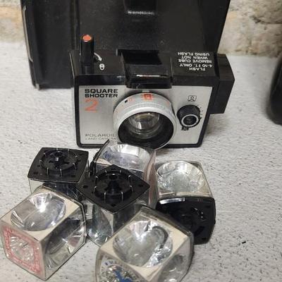 Sale Photo Thumbnail #712: Pair of Polaroids - Pronto RF and Square Shooter 2 with bag.  Few flash squares as well. Fits larger flat rate box