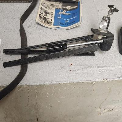 Sale Photo Thumbnail #722: Bell and Howell 311 in case...camera is in thought shape. Old tripod, Univex and exposure meter