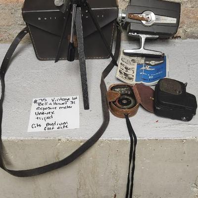 Sale Photo Thumbnail #718: Bell and Howell 311 in case...camera is in thought shape. Old tripod, Univex and exposure meter