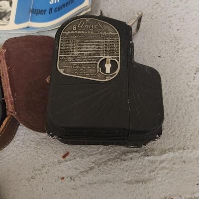 Sale Photo Thumbnail #719: Bell and Howell 311 in case...camera is in thought shape. Old tripod, Univex and exposure meter