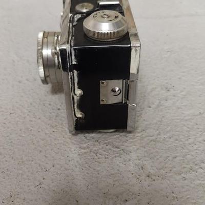 Sale Photo Thumbnail #730: Argus C3 camera with neat writing inside the case and L3 light meter. Fits medium flat rate box