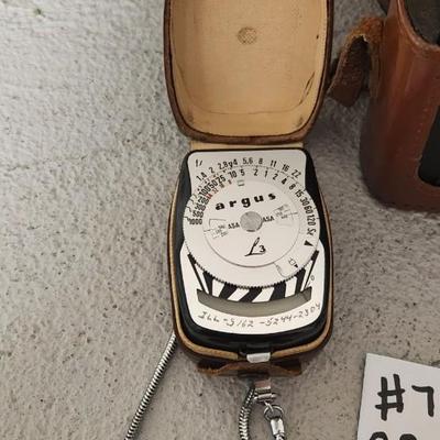 Sale Photo Thumbnail #727: Argus C3 camera with neat writing inside the case and L3 light meter. Fits medium flat rate box