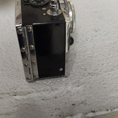 Sale Photo Thumbnail #732: Argus C3 camera with neat writing inside the case and L3 light meter. Fits medium flat rate box