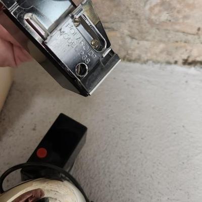 Sale Photo Thumbnail #738: Pair of Polaroid Flash Guns in box with instructions. Fits medium flat rate box