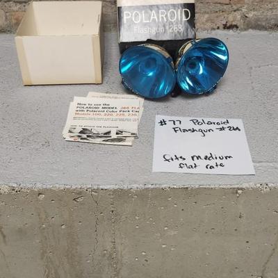 Sale Photo Thumbnail #736: Pair of Polaroid Flash Guns in box with instructions. Fits medium flat rate box