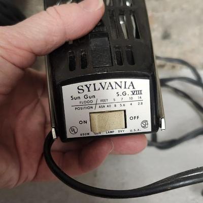 Sale Photo Thumbnail #752: Pair of sun guns, tripod (heavy) battery pack and exposure meter. Fits large flat rate box