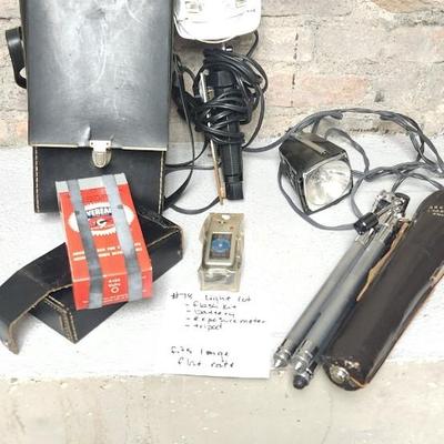 Sale Photo Thumbnail #743: Pair of sun guns, tripod (heavy) battery pack and exposure meter. Fits large flat rate box