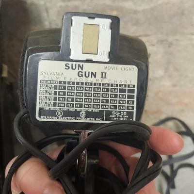 Sale Photo Thumbnail #753: Pair of sun guns, tripod (heavy) battery pack and exposure meter. Fits large flat rate box