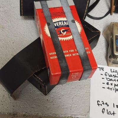 Sale Photo Thumbnail #744: Pair of sun guns, tripod (heavy) battery pack and exposure meter. Fits large flat rate box