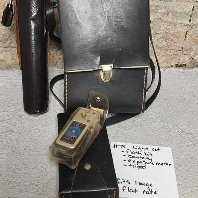 Sale Photo Thumbnail #754: Pair of sun guns, tripod (heavy) battery pack and exposure meter. Fits large flat rate box