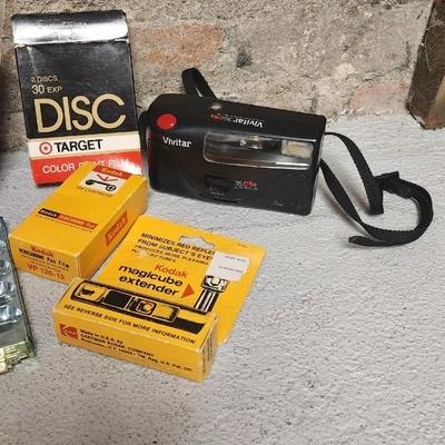 Sale Photo Thumbnail #767: Misc lot of flash bulbs, film and a couple vivitar cameras