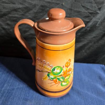 Wooden nut bowl with two wood candle holders a Interpur insulated carafe pitcher with four mugs