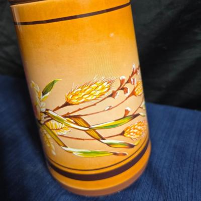 Wooden nut bowl with two wood candle holders a Interpur insulated carafe pitcher with four mugs