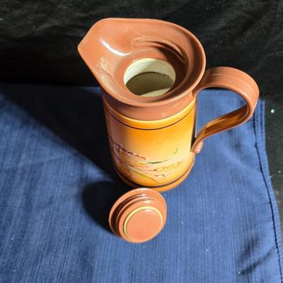 Wooden nut bowl with two wood candle holders a Interpur insulated carafe pitcher with four mugs