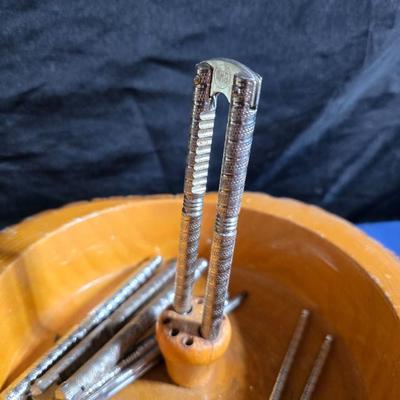 Wooden nut bowl with two wood candle holders a Interpur insulated carafe pitcher with four mugs