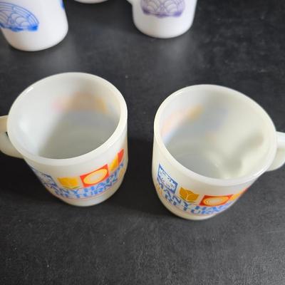 Set of Vintage milk glass mugs featuring the logo for the International Order of the Rainbow for Girls (IORG), with two mcdonalds mugs