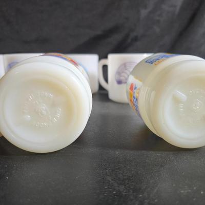 Set of Vintage milk glass mugs featuring the logo for the International Order of the Rainbow for Girls (IORG), with two mcdonalds mugs