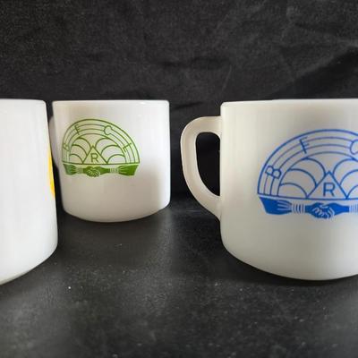 Set of Vintage milk glass mugs featuring the logo for the International Order of the Rainbow for Girls (IORG), with two mcdonalds mugs