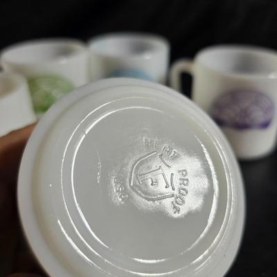Set of Vintage milk glass mugs featuring the logo for the International Order of the Rainbow for Girls (IORG), with two mcdonalds mugs