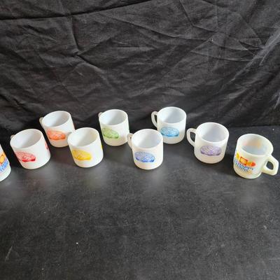 Set of Vintage milk glass mugs featuring the logo for the International Order of the Rainbow for Girls (IORG), with two mcdonalds mugs