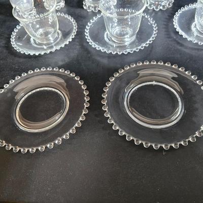 Imperial Glass Company Candlewick pattern - salt & pepper shakers -two tall glasses - three mugs with saucers - three snack plates -...