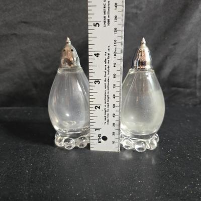 Imperial Glass Company Candlewick pattern - salt & pepper shakers -two tall glasses - three mugs with saucers - three snack plates -...