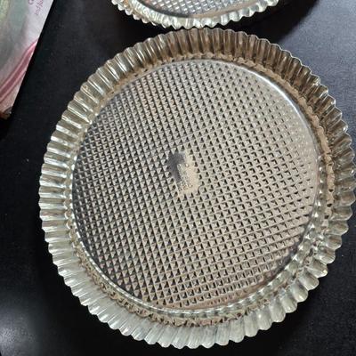 Stuart Bass three-blackbird pie funnel - Wilton 3-tier baking rack - a variety of pie pans and a cookbook