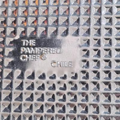 Stuart Bass three-blackbird pie funnel - Wilton 3-tier baking rack - a variety of pie pans and a cookbook