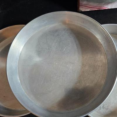 Stuart Bass three-blackbird pie funnel - Wilton 3-tier baking rack - a variety of pie pans and a cookbook