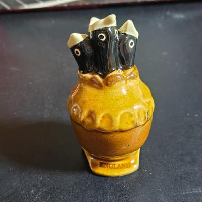 Stuart Bass three-blackbird pie funnel - Wilton 3-tier baking rack - a variety of pie pans and a cookbook