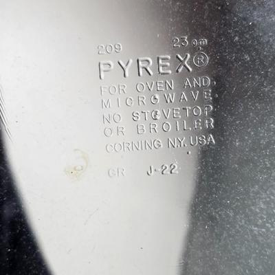 Stuart Bass three-blackbird pie funnel - Wilton 3-tier baking rack - a variety of pie pans and a cookbook