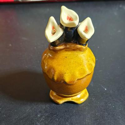 Stuart Bass three-blackbird pie funnel - Wilton 3-tier baking rack - a variety of pie pans and a cookbook