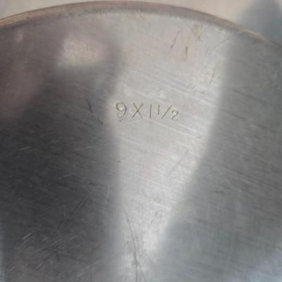 Stuart Bass three-blackbird pie funnel - Wilton 3-tier baking rack - a variety of pie pans and a cookbook