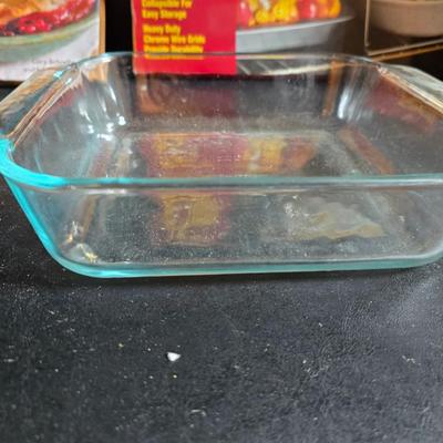 Stuart Bass three-blackbird pie funnel - Wilton 3-tier baking rack - a variety of pie pans and a cookbook