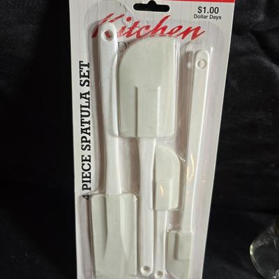 Kitchen accessories - Measure cups = Measuring spoons - Hot pads - Spatulas - Pitcher - Refrigerator liners and more