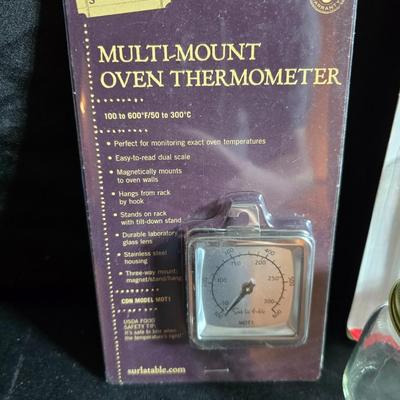 Kitchen accessories - Measure cups = Measuring spoons - Hot pads - Spatulas - Pitcher - Refrigerator liners and more