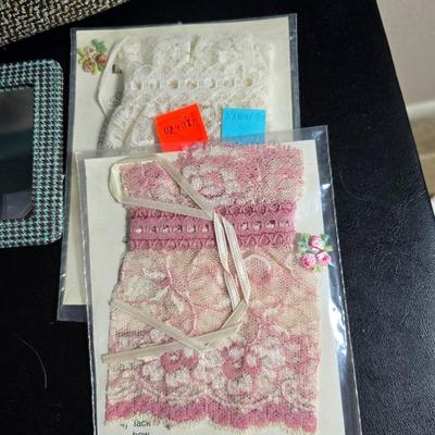 Dress shaped hanging organizer - Mirror - Nail care kit - Mini shaver - small trinket boxes - soap dispenser - and other hygiene makeup...