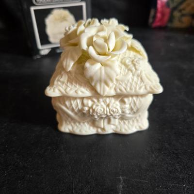 Dress shaped hanging organizer - Mirror - Nail care kit - Mini shaver - small trinket boxes - soap dispenser - and other hygiene makeup...