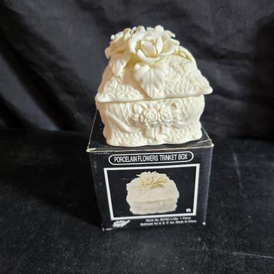 Dress shaped hanging organizer - Mirror - Nail care kit - Mini shaver - small trinket boxes - soap dispenser - and other hygiene makeup...