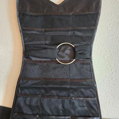 Dress shaped hanging organizer - Mirror - Nail care kit - Mini shaver - small trinket boxes - soap dispenser - and other hygiene makeup...