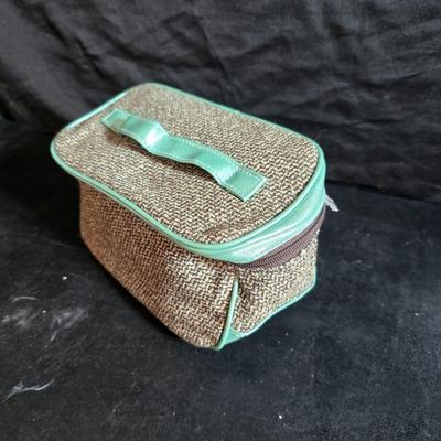 Dress shaped hanging organizer - Mirror - Nail care kit - Mini shaver - small trinket boxes - soap dispenser - and other hygiene makeup...