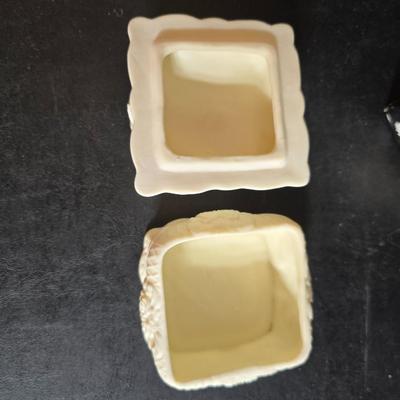 Dress shaped hanging organizer - Mirror - Nail care kit - Mini shaver - small trinket boxes - soap dispenser - and other hygiene makeup...