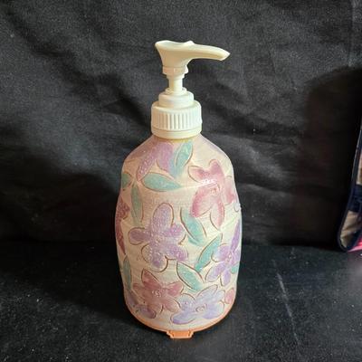 Dress shaped hanging organizer - Mirror - Nail care kit - Mini shaver - small trinket boxes - soap dispenser - and other hygiene makeup...