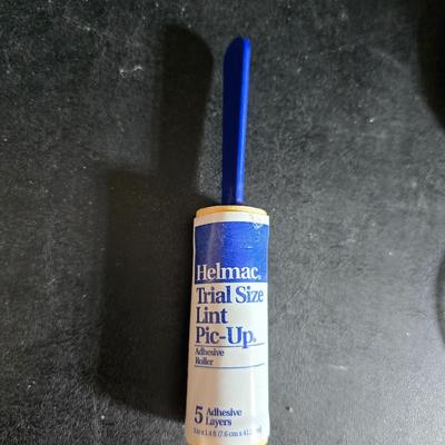 Dress shaped hanging organizer - Mirror - Nail care kit - Mini shaver - small trinket boxes - soap dispenser - and other hygiene makeup...